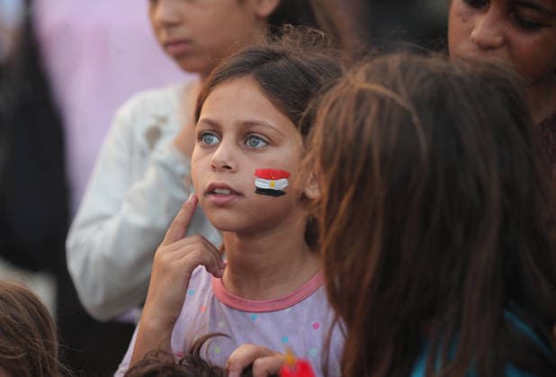 Palestinians watch the Iran-Egypt match on giant screens set up amid the rubble GAZA CITY, GAZA, PALESTINE - JUNE 27: Palestinians holding flags gather to watch the 2026 FIFA World Cup First Stage Group G match between Egypt and Iran on a giant screen set up among the rubble of destroyed buildings despite Israel s ongoing attacks in Gaza City, Gaza, Palestine, on June 27, 2026. Abdalhkem Abu Riash Anadolu Gaza City Gaza. Editorial use only. Please get in touch for any other usage.  Copyright: x2026xAnadoluxAbdalhkemxAbuxRiashx