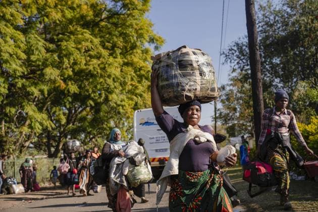 Undocumented Malawian migrants are being evacuated from South Africa KWAZULU-NATAL, SOUTH AFRICA - JUNE 26: Women carry their loads as thousands of Malawian migrants were put on buses to return to their home country following a rise in xenophobic attacks and anti-immigrant protests in the city of Pietermaritzburg in KwaZulu-Natal province, South Africa, on June 26, 2026. Ihsaan Haffejee Anadolu KwaZulu-Natal South Africa. Editorial use only. Please get in touch for any other usage.  Copyright: x2026xAnadoluxIhsaanxHaffejeex