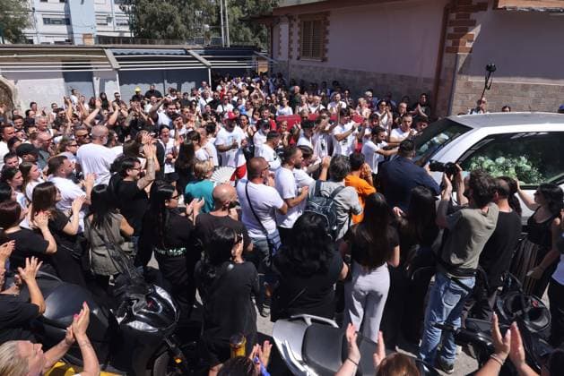 IPA86125448 - Naples: The funeral of Lorenzo Spasiano, the 19-year-old worker killed in Miano by a gunshot to the chest. A huge crowd gathered outside the church to say a final goodbye to Lorenzo  Copyright: xx xx 86125448