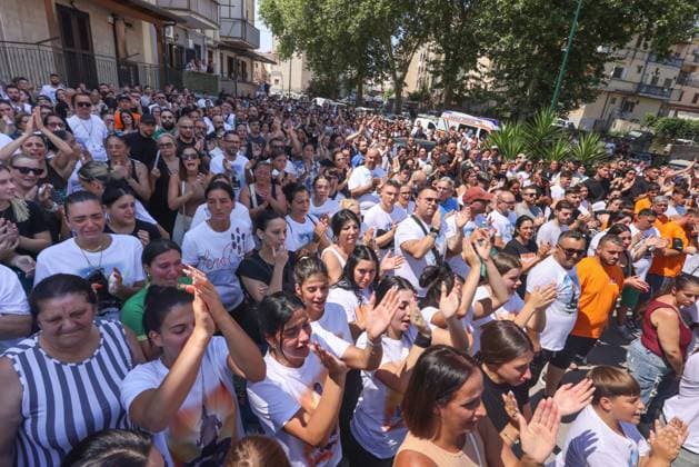 IPA86125451 - Naples: The funeral of Lorenzo Spasiano, the 19-year-old worker killed in Miano by a gunshot to the chest. A huge crowd gathered outside the church to say a final goodbye to Lorenzo  Copyright: xx xx 86125451