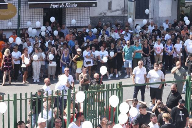 IPA86125499 - Naples: The funeral of Lorenzo Spasiano, the 19-year-old worker killed in Miano by a gunshot to the chest. A huge crowd gathered outside the church to say a final goodbye to Lorenzo  Copyright: xx xx 86125499