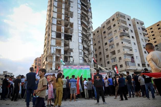 Displaced Gazans Watch Egypt-Iran World Cup Match Amid War Devastation GAZA, PALESTINE JUNE 27: Palestinians watch the FIFA World Cup 2026 match between Egypt and Iran among tents and the widespread destruction caused by the ongoing war in the Gaza Strip on the morning of June 27, 2026. Despite displacement and harsh humanitarian conditions, residents gather to follow the tournament as football offers a brief escape from daily hardships. Gaza Palestine, State of Copyright: x xMohammedxMxSkaikx xJNAxPressx