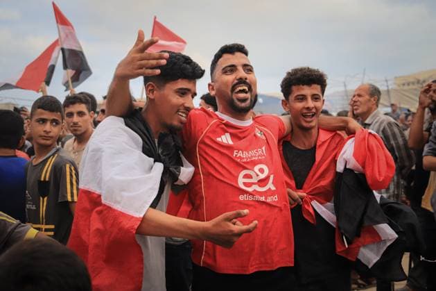 Displaced Gazans Watch Egypt-Iran World Cup Match Amid War Devastation GAZA, PALESTINE JUNE 27: Palestinians watch the FIFA World Cup 2026 match between Egypt and Iran among tents and the widespread destruction caused by the ongoing war in the Gaza Strip on the morning of June 27, 2026. Despite displacement and harsh humanitarian conditions, residents gather to follow the tournament as football offers a brief escape from daily hardships. Gaza Palestine, State of Copyright: x xMohammedxMxSkaikx xJNAxPressx