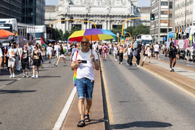 IPA86131365 - Milan, Central Station, Via Vittor Pisani, June 27, 2026, Milan Pride, warm umbrella  Copyright: xFrancescoxEnriquezx xFrancescoxEnriquezx 86131365