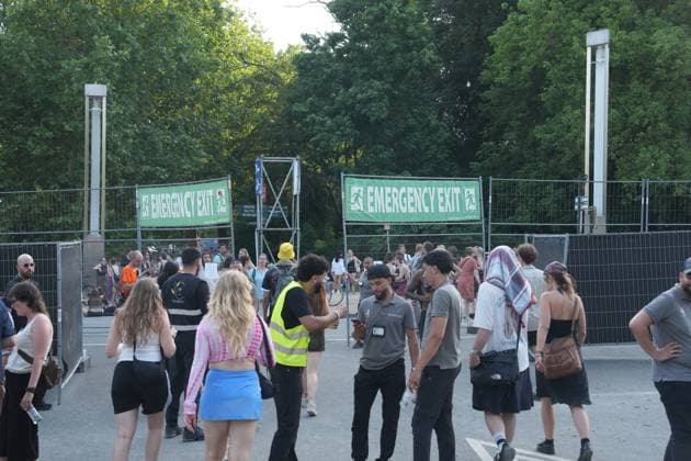People leave the festival grounds at the evacuation of the Couleur Cafe music festival, due to the strong winds expected, in Brussels, Saturday 27 June 2026. The 35th edition of the festival is taking place from June 26th to June 28th. MARIUS BURGELMAN  MariusxBurgelman 179580059