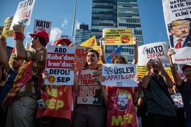June 27, 2026, Istanbul, Istanbul, Turkey: Activists from the No to NATO! Coordination staged a protest in front of Trump Towers in Istanbul, Turkey, carrying a banner reading Imperialist war organization NATO and Trump, you are not welcome! The demonstration opposed the upcoming NATO Summit scheduled to take place in Ankara on July 7Ã¢â‚¬8. Istanbul Turkey  - ZUMAt171 20260627_zip_t171_013 Copyright: xAbdullahxTepelix