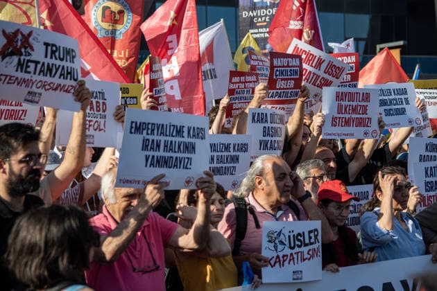June 27, 2026, Istanbul, Istanbul, Turkey: Activists from the No to NATO! Coordination staged a protest in front of Trump Towers in Istanbul, Turkey, carrying a banner reading Imperialist war organization NATO and Trump, you are not welcome! The demonstration opposed the upcoming NATO Summit scheduled to take place in Ankara on July 7Ã¢â‚¬8. Istanbul Turkey - ZUMAt171 20260627_zip_t171_020 Copyright: xAbdullahxTepelix