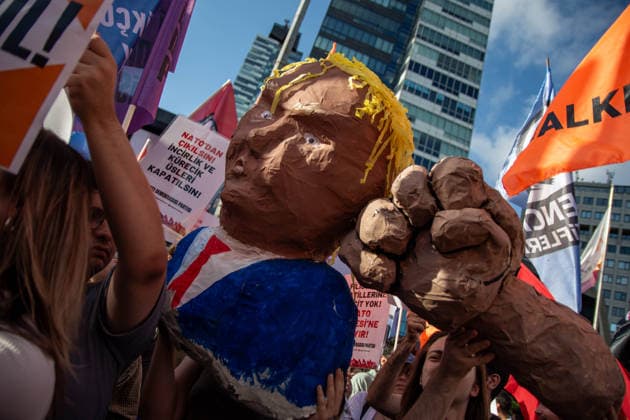 June 27, 2026, Istanbul, Istanbul, Turkey: Activists from the No to NATO! Coordination staged a protest in front of Trump Towers in Istanbul, Turkey, carrying a banner reading Imperialist war organization NATO and Trump, you are not welcome! The demonstration opposed the upcoming NATO Summit scheduled to take place in Ankara on July 7Ã¢â‚¬8. Istanbul Turkey - ZUMAt171 20260627_zip_t171_021 Copyright: xAbdullahxTepelix