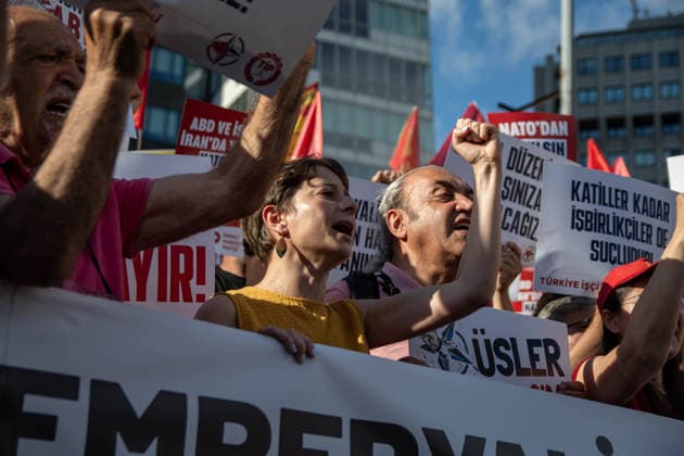 June 27, 2026, Istanbul, Istanbul, Turkey: Activists from the No to NATO! Coordination staged a protest in front of Trump Towers in Istanbul, Turkey, carrying a banner reading Imperialist war organization NATO and Trump, you are not welcome! The demonstration opposed the upcoming NATO Summit scheduled to take place in Ankara on July 7Ã¢â‚¬8. Istanbul Turkey - ZUMAt171 20260627_zip_t171_029 Copyright: xAbdullahxTepelix