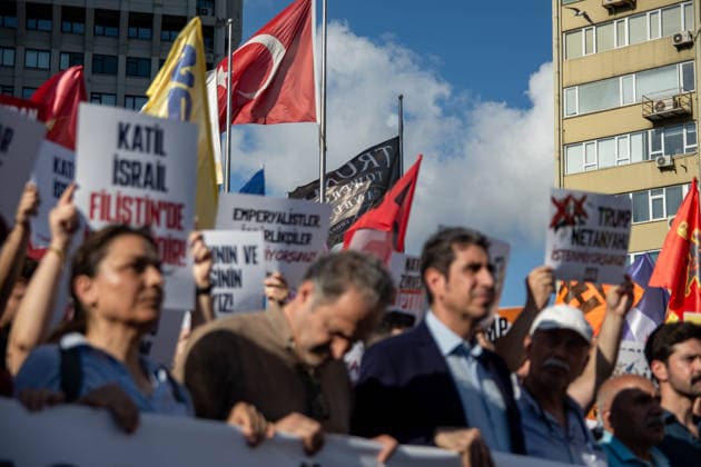 June 27, 2026, Istanbul, Istanbul, Turkey: Activists from the No to NATO! Coordination staged a protest in front of Trump Towers in Istanbul, Turkey, carrying a banner reading Imperialist war organization NATO and Trump, you are not welcome! The demonstration opposed the upcoming NATO Summit scheduled to take place in Ankara on July 7Ã¢â‚¬8. Istanbul Turkey - ZUMAt171 20260627_zip_t171_032 Copyright: xAbdullahxTepelix