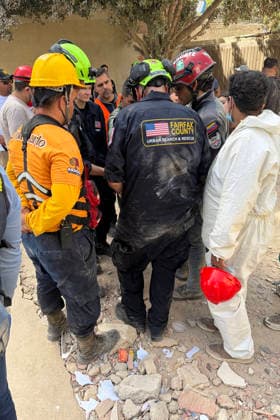 Members of USA-01, the Urban Search and Rescue Team from Fairfax County, VA, on the ground in Venezuela on Saturday, June 27, 2026, conducting search and rescue operations around the clock across multiple structures to reach any potential survivors. USA-01 arrived with 79 personnel, six K9s, and 70k lbs of equipment, to assist Venezuelan authorities with search and rescue operations following the recent earthquakes. Photo via VA-TF1 USA-01  WAX2026062702 VA-TF1 USA-01