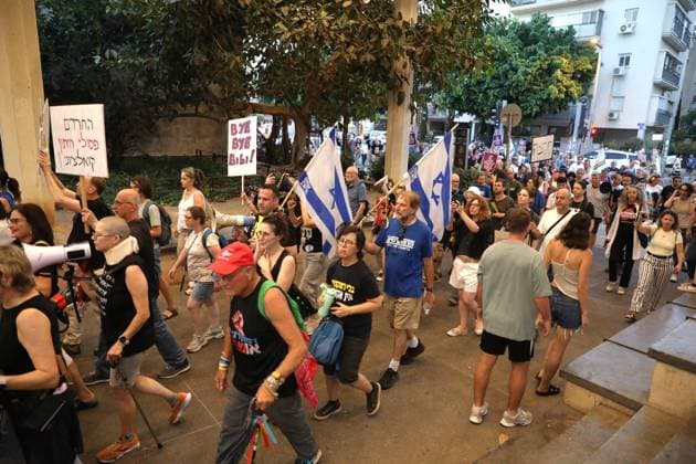 Protest against government in Tel Aviv TEL AVIV, ISRAEL - JUNE 27: People stage a protest against Prime Minister Benjamin Netanyahu and the current government as they gather in Habima Square in Tel Aviv, Israel on June 27, 2026. Protestors, calling on Israel to end its attacks on Gaza and Lebanon, carried placards criticizing the government’s war policies and the compulsory military service imposed on Ultra-Orthodox (Haredi) Jews. Gideon Markowicz Anadolu Tel Aviv Israel. Editorial use only. Please get in touch for any other usage.  Copyright: x2026xAnadoluxGideonxMarkowiczx