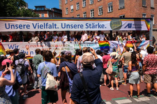 June 27, 2026, Munich, Bayern, Germany: People march through Munich s streets under the banner Our diversity. Our strength to advocate for LGBTQIA+ rights, despite high temperatures. Munich Germany - ZUMAm309 20260627_zip_m309_004 Copyright: xJuliusxMortsix