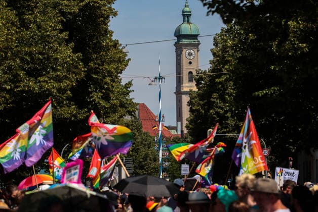 June 27, 2026, Munich, Bayern, Germany: People march through Munich s streets under the banner Our diversity. Our strength to advocate for LGBTQIA+ rights, despite high temperatures. Munich Germany  - ZUMAm309 20260627_zip_m309_019 Copyright: xJuliusxMortsix