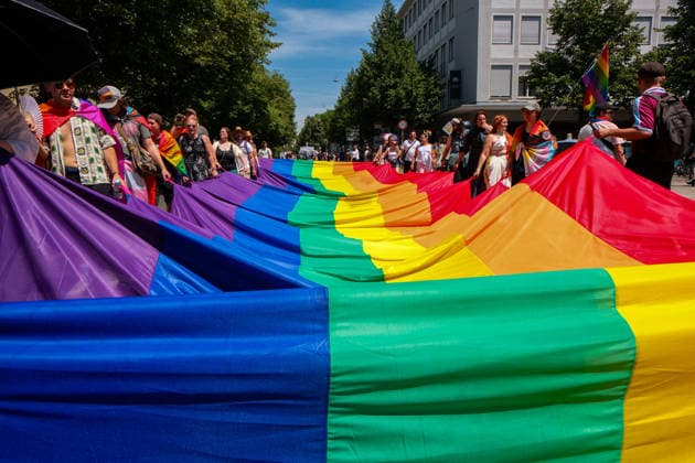 June 27, 2026, Munich, Bayern, Germany: People march through Munich s streets under the banner Our diversity. Our strength to advocate for LGBTQIA+ rights, despite high temperatures. Munich Germany - ZUMAm309 20260627_zip_m309_014 Copyright: xJuliusxMortsix