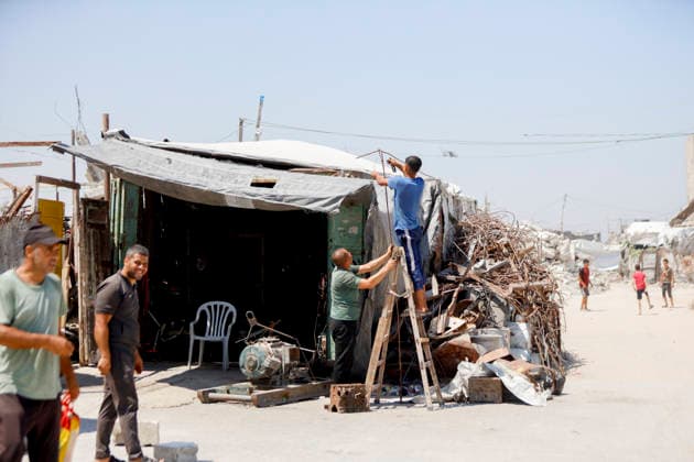 Jabalia Gaza Daily Life Palestinian residents adjust a makeshift shelter in Jabalia, northern Gaza Strip on June 27, 2026. Residents remain among the ruins of damaged and destroyed buildings in Jabalia, where access to basic services such as water, electricity, and shelter remains severely limited. Gaza Gaza Strip Palestinian Territories Copyright: xAhmedxAlxArinix