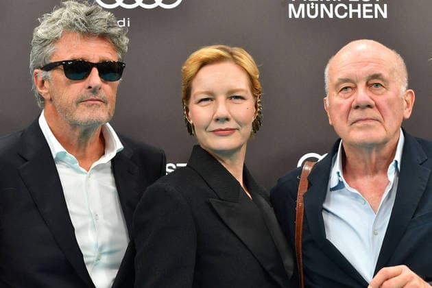 PaweÅ‚ Pawlikowski, Sandra Hueller und Hanns Zischler bei der Eroeffnung vom 43. Filmfest Muenchen mit der Film Premiere von TVaterland am 27.06.2026 in Muenchen PaweÅ‚ Pawlikowski, Sandra Hueller and Hanns Zischler attend the Opening Red Carpet of the 43rd Munich Film Festival (Filmfest München) at Gasteig HP 8 on June 27, 2026 in Munich, Germany 43. Filmfest Muenchen Opening *** Pawel Pawlikowski, Sandra Hueller, and Hanns Zischler at the opening of the 43rd Munich Film Festival (Filmfest München) with the premiere of *TVaterland* on June 27, 2026, in Munich PaweÅ’ Pawlikowski, Sandra Hueller, and Hanns Zischler attend the opening red carpet of the 43rd Munich Film Festival (Filmfest München) at Gasteig HP 8 on June 27, 2026, in M 