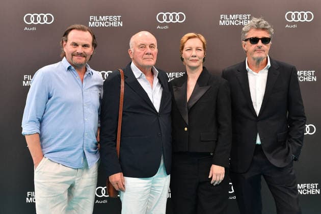 Devid Striesow, Hanns Zischler, Sandra Hueller und PaweÅ‚ Pawlikowski bei der Eroeffnung vom 43. Filmfest Muenchen mit der Film Premiere von TVaterland am 27.06.2026 in Muenchen Devid Striesow, Hanns Zischler, Sandra Hueller and PaweÅ‚ Pawlikowski attend the Opening Red Carpet of the 43rd Munich Film Festival (Filmfest München) at Gasteig HP 8 on June 27, 2026 in Munich, Germany 43. Filmfest Muenchen Opening *** Devid Striesow, Hanns Zischler, Sandra Hueller, and Pawel Pawlikowski at the opening of the 43rd Munich Film Festival (Filmfest München) with the premiere of *TVaterland* on June 27, 2026, in Munich. Devid Striesow, Hanns Zischler, Sandra Hueller, and Pawel Pawlikowski attend the opening red carpet of the 43rd Munich Film Fe 