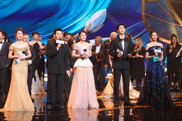 SHANGHAI, CHINA - JUNE 26: Actor Zhang Linghe (R2) and actress Guan Xiaotong (R1) serve as host and hostess during the Magnolia Awards Ceremony of the 31st Shanghai TV Festival (STVF) on June 26, 2026 in Shanghai, China.  Copyright: xVCGx 111650734631