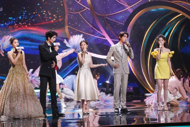 SHANGHAI, CHINA - JUNE 26: Actor Zhang Linghe (L2) and actress Guan Xiaotong (L1) serve as host and hostess during the Magnolia Awards Ceremony of the 31st Shanghai TV Festival (STVF) on June 26, 2026 in Shanghai, China.  Copyright: xVCGx 111650734637