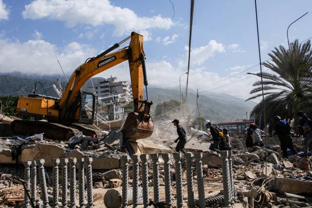 Military restricts access to Venezuela s La Guaira as earthquake recovery continues LA GUAIRA, VENEZUELA - JUNE 27: Military personnel control access to La Guaira state as heavy machinery is deployed to clear debris following the recent twin earthquakes in Venezuela, on June 27, 2026. Search and rescue operations continue amid hopes of finding more survivors, while international civil protection teams begin arriving to support ongoing emergency response efforts. Diko Betancourt Anadolu La Guaira Venezuela. Editorial use only. Please get in touch for any other usage.  Copyright: x2026xAnadoluxDikoxBetancourtx