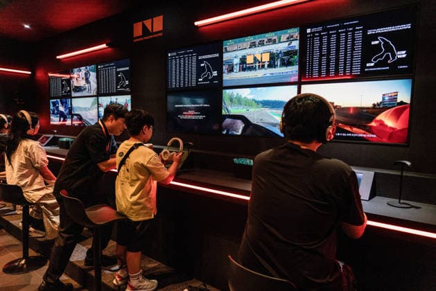 June 27, 2026, Busan, South Korea: People seen experiencing the virtual strategic command center of Genesis Magma Racing (GMR) in the FIA World Endurance Championship (WEC) during the Busan International Mobility Show 2026 (BIMOS 2026) at BEXCO. Busan International Mobility Show 2026 (BIMOS 2026) is happening from June 26 to July 5. Busan South Korea - ZUMAs197 20260627_aaa_s197_123 Copyright: xSimonxShinx