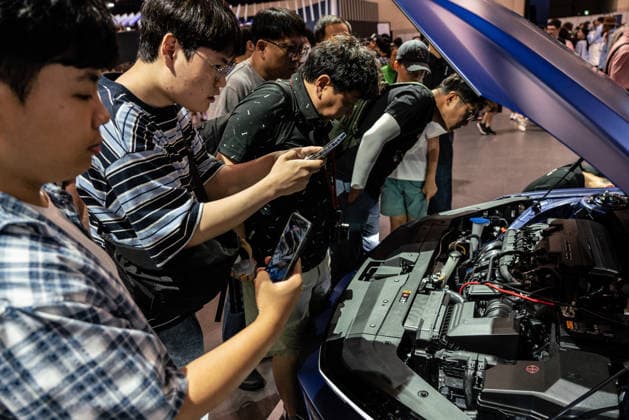 June 27, 2026, Busan, South Korea: People seen taking photos of engine of The All-New Avante CN8 during the Busan International Mobility Show 2026 (BIMOS 2026) at BEXCO. Busan International Mobility Show 2026 (BIMOS 2026) is happening from June 26 to July 5. Busan South Korea - ZUMAs197 20260627_aaa_s197_130 Copyright: xSimonxShinx