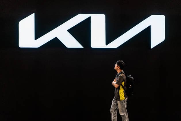 June 27, 2026, Busan, South Korea: A man walks under the KIA logo during the Busan International Mobility Show 2026 (BIMOS 2026) at BEXCO. Busan International Mobility Show 2026 (BIMOS 2026) is happening from June 26 to July 5. Busan South Korea - ZUMAs197 20260627_aaa_s197_149 Copyright: xSimonxShinx