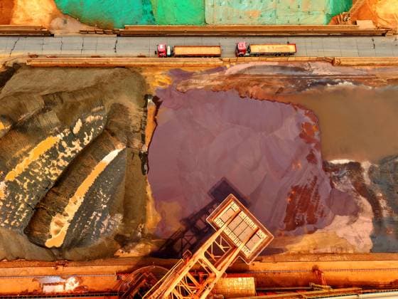 Qingdao Port Ore Terminal Construction machinery is sorting and loading imported iron ore at the Qingdao Port Ore Terminal in Qingdao, Shandong Province, China on June 28, 2026. Qingdao Shandong China  Copyright: xCFOTOx i1782655941004