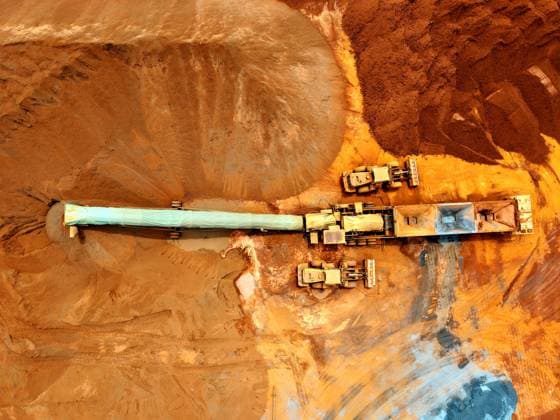 Qingdao Port Ore Terminal Construction machinery is sorting and loading imported iron ore at the Qingdao Port Ore Terminal in Qingdao, Shandong Province, China on June 28, 2026. Qingdao Shandong China  Copyright: xCFOTOx i1782655941290