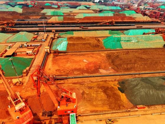 Qingdao Port Ore Terminal Construction machinery is sorting and loading imported iron ore at the Qingdao Port Ore Terminal in Qingdao, Shandong Province, China on June 28, 2026. Qingdao Shandong China  Copyright: xCFOTOx i1782655942782