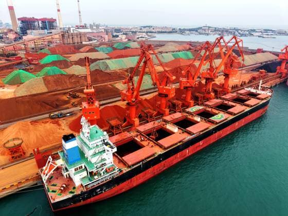 Qingdao Port Ore Terminal A cargo ship was unloading imported iron ore at the ore terminal of Qingdao Port, Qingdao City, Shandong Province, China on June 28, 2026. Qingdao Shandong China  Copyright: xCFOTOx i1782655943227