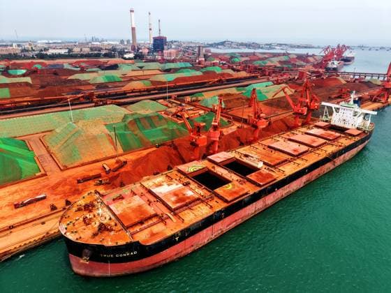 Qingdao Port Ore Terminal A cargo ship was unloading imported iron ore at the ore terminal of Qingdao Port, Qingdao City, Shandong Province, China on June 28, 2026. Qingdao Shandong China  Copyright: xCFOTOx i1782655944084