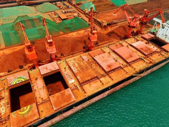 Qingdao Port Ore Terminal A cargo ship was unloading imported iron ore at the ore terminal of Qingdao Port, Qingdao City, Shandong Province, China on June 28, 2026. Qingdao Shandong China  Copyright: xCFOTOx i1782655944231