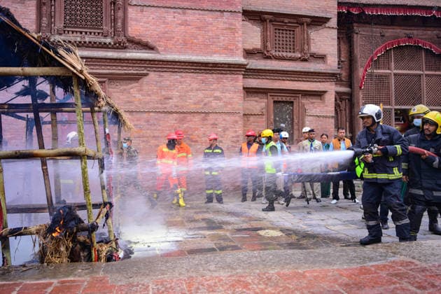 June 28, 2026, Kathmandu, Bagmati, Nepal: KATHMANDU, NEPAL Ã¢â‚¬ 28 JUNE 2026: Personnel from the Nepal Army, Nepal Police, Nepal Traffic Police, Armed Police Force (APF), Kathmandu Metropolitan City, Nepal Scouts, and the Nepal Red Cross Society participate in a joint multi-agency disaster response simulation exercise at Hanuman Dhoka Durbar Square in Kathmandu, Nepal, on June 28, 2026. The exercise included coordinated demonstrations of earthquake and fire emergency response, urban search and rescue, casualty evacuation, firefighting, first aid, and other disaster management operations aimed at strengthening inter-agency preparedness and public awareness. Kathmandu Nepal - ZUMAs330 20260628_zsp_s330_015 Copyright: xSafalxPrakashxShresthax