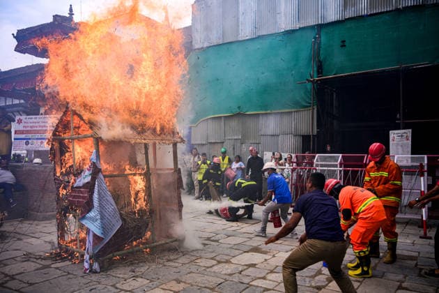 Disaster Response Exercise Conducted At Hanuman Dhoka, Kathmandu Personnel from the Nepal Army, Nepal Police, Nepal Traffic Police, Armed Police Force, Kathmandu Metropolitan City, Nepal Scouts, and the Nepal Red Cross Society participate in a joint multi-agency disaster response simulation exercise at Hanuman Dhoka Durbar Square in Kathmandu, Nepal, on June 28, 2026. The exercise includes coordinated demonstrations of earthquake and fire emergency response, urban search and rescue, casualty evacuation, firefighting, first aid, and other disaster management operations aimed at strengthening inter-agency preparedness and public awareness. Kathmandu Bagmati Nepal  Copyright: xSafalxPrakashxShresthax originalFilename: shrestha-disaster260628_npevw.jpg