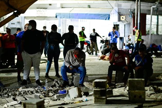 Turkish rescue teams deployed to quake-hit Venezuela LA GUAIRA, VENEZUELA - JUNE 28: Residents wait for their loved ones to be pulled out from rubble of collapsed 14-story building by Turkish search and rescue teams, including specialist personnel from the Disaster and Emergency Management Authority (AFAD) and the Turkish Armed Forces, in the La Paez neighborhood of La Guaira, Venezuela, on June 28, 2026. Following a series of devastating, high-magnitude earthquakes that struck Venezuela, Turkish emergency crews swiftly deployed to the hard-hit coastal city of La Guaira. Cem Tekkesinoglu Anadolu La Guaira Venezuela. Editorial use only. Please get in touch for any other usage.  Copyright: x2026xAnadoluxCemxTekkesinoglux