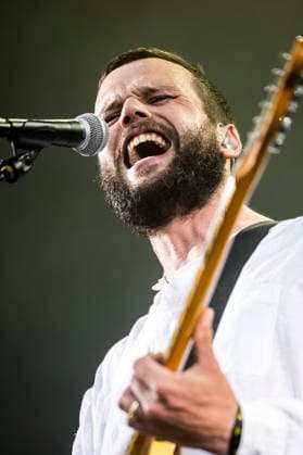 White Lies live at Tinderbox 2026 Odense, Denmark. 27th, June 2026. The English indie rock and post-punk band White Lies performs a live concert during the Danish music festival Tinderbox 2026 in Odense. Here singer and guitarist Harry McVeigh is seen live on stage. Denmark, Odense  Copyright: xGonzalesxPhoto LassexLagonix