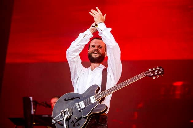 White Lies live at Tinderbox 2026 Odense, Denmark. 27th, June 2026. The English indie rock and post-punk band White Lies performs a live concert during the Danish music festival Tinderbox 2026 in Odense. Here singer and guitarist Harry McVeigh is seen live on stage. Denmark, Odense  Copyright: xGonzalesxPhoto LassexLagonix
