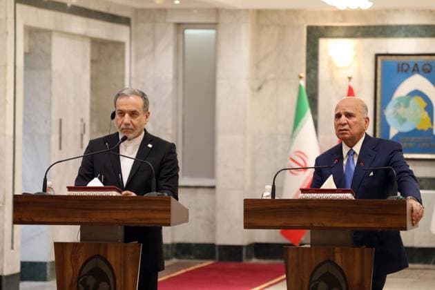 (260628) -- BAGHDAD, June 28, 2026 -- Iraqi Foreign Minister Fuad Hussein (R) and his visiting Iranian counterpart Seyed Abbas Araghchi hold a joint press conference in Baghdad, Iraq, on June 28, 2026. Hussein met Araghchi here on Sunday to discuss bilateral ties and regional security. ) IRAQ-BAGHDAD-IRAN-FM-VISIT KhalilxDawood 