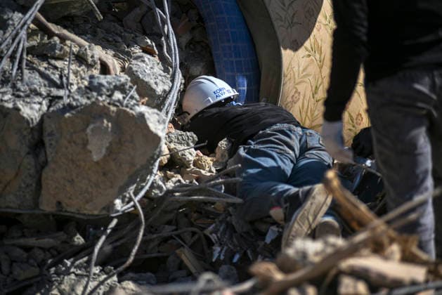 Members of Caracas firefighters search for victims amid debris of a demolished building after a magnitude 7.2 earthquake struck Venezuela and other regions in the Caribbean in La Guaira, Venezuela, on June 27, 2026. According to the U.S. Geological Survey, a powerful 7.5?magnitude aftershock struck after the main quake. Medical and media sources reported that the death toll has risen to around 1,500, with some 3,000 others injured. A web page created to track the missing has listed nearly 50,000 people as unaccounted for. photo by Jonathan Lanza  VAN2026062802 JonathanxLanza