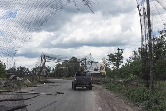 White Angels police unit evacuates civilians in Druzhkivka DRUZHKIVKA, UKRAINE - JUNE 28: A Ukrainian soldier keeps an eye out for drones from the back of a pick-up truck on a road in the city of Druzhkivka, Ukraine, 28 June 2026. Diego Herrera Carcedo Anadolu Druzhkivka Ukraine. Editorial use only. Please get in touch for any other usage.  Copyright: x2026xAnadoluxDiegoxHerreraxCarcedox