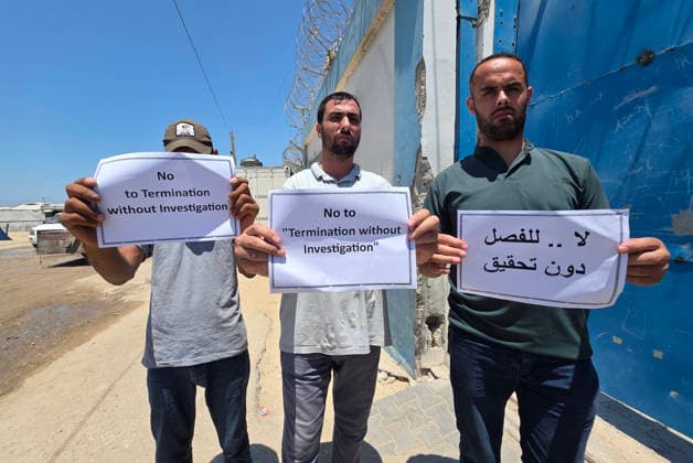 UNRWA employees stage protest over dismissal of 70 workers Employees of the United Nations Relief and Works Agency (UNRWA) take part in an open-ended sit-in outside the agency s industrial office in Khan Younis, southern Gaza Strip, on June 28, 2026, protesting a decision to dismiss 70 employees from their jobs. The protesters called on the agency s administration to reverse the decision, saying they would continue the sit-in until their demands are met. Photo by Tariq Mohammad APA Images Khan Yunis Gaza Strip Palestinian Territory 280626_Khan_Yunis_TM_01(8) Copyright: xapaimagesxTariqxMohammad xapaimagesx