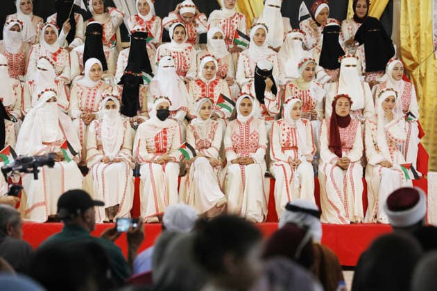 Mass Wedding Ceremony Brings Together 150 Couples in Northern Gaza Palestinian brides and grooms take part in a mass wedding ceremony in Jabalia, northern Gaza Strip, on June 28, 2026. The event was organized by the Ghouth Charitable Foundation as part of a social initiative to support the marriage of 150 couples from northern Gaza, months after the area suffered extensive destruction during the war. Photo by Bilal Osama apaimages Gaza city Gaza Strip Palestinian Territory 280626_Jabalia_BO_00(57) Copyright: xapaimagesxBilalxOsamax xapaimagesx