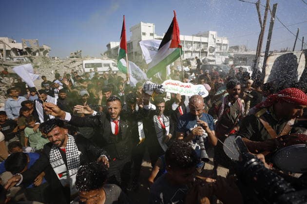 150 Palestinian couples tie the knot in mass wedding at Jabalia Camp GAZA, PALESTINE - JUNE 28: Newlyweds celebrate as 150 Palestinian couples tie the knot in a mass wedding ceremony organized by a charity organization at the Jabalia Refugee Camp in the northern Gaza Strip, Gaza, Palestine on June 28, 2026. The young couples advanced towards the wedding hall accompanied by traditional songs and dances. Ahmed Jihad Ibrahim Al-arini Anadolu Gaza City Gaza. Editorial use only. Please get in touch for any other usage.  Copyright: x2026xAnadoluxAhmedxJihadxIbrahimxAl-arinix