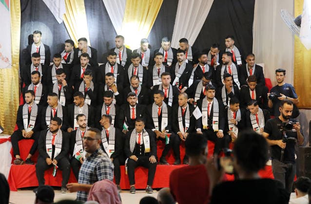 Mass Wedding Ceremony Brings Together 150 Couples in Northern Gaza Palestinian brides and grooms take part in a mass wedding ceremony in Jabalia, northern Gaza Strip, on June 28, 2026. The event was organized by the Ghouth Charitable Foundation as part of a social initiative to support the marriage of 150 couples from northern Gaza, months after the area suffered extensive destruction during the war. Photo by Bilal Osama apaimages Gaza city Gaza Strip Palestinian Territory 280626_Jabalia_BO_00(44) Copyright: xapaimagesxBilalxOsamax xapaimagesx