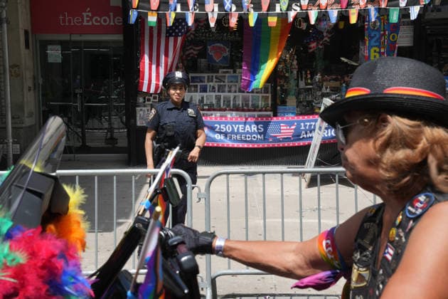 June 28, 2026, New Yok, New York, USA: A member of the Sirens NYC rides a motorcycle down Fifth Avenue past a store celebrating America s 250th Anniversary at the Annual NYC Pride March on June 28, 2026 in New York. NYC s Pride March began as a demonstration honoring the 1969 Stonewall Riots, has evolved into a global symbol of LGBTQIA+ resilience, unity and activism. New Yok USA  - ZUMAb148 20260628_zap_b148_001 Copyright: xBryanxSmithx