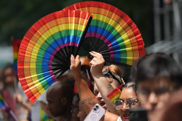 June 28, 2026, New Yok, New York, USA: People wave fans at the Annual NYC Pride March on June 28, 2026 in New York. NYC s Pride March began as a demonstration honoring the 1969 Stonewall Riots, has evolved into a global symbol of LGBTQIA+ resilience, unity and activism. New Yok USA  - ZUMAb148 20260628_zap_b148_004 Copyright: xBryanxSmithx