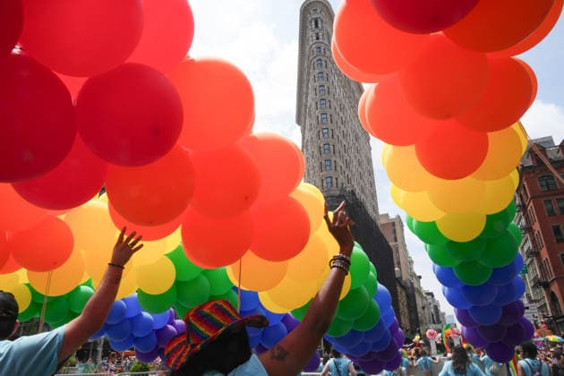 June 28, 2026, New Yok, New York, USA: Volunteers carry rainbow balloons past the Flatiron Building at the Annual NYC Pride March on June 28, 2026 in New York. NYC s Pride March began as a demonstration honoring the 1969 Stonewall Riots, has evolved into a global symbol of LGBTQIA+ resilience, unity and activism. New Yok USA - ZUMAb148 20260628_zap_b148_015 Copyright: xBryanxSmithx