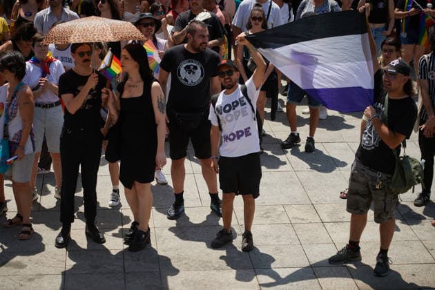 June 28, 2026, Pamplona, Spain: Demonstrators hold a flag during the Gay Pride march. Hundreds of people participated in the demonstration held to mark International LGBTI+ Pride Day. The main focus of the demonstration was the discrimination against the refugee community, and of course, respect from institutions, while some feminist groups are excluding transgender people. Pamplona Spain  - ZUMAs197 20260628_aaa_s197_071 Copyright: xElsaxAxBravox